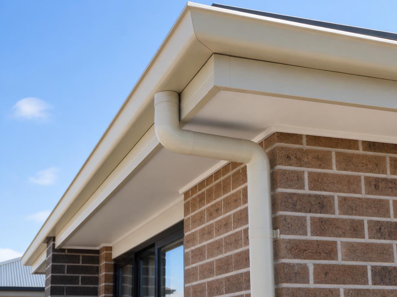 New Colorbond guttering and downpipe fitted to an Australian home